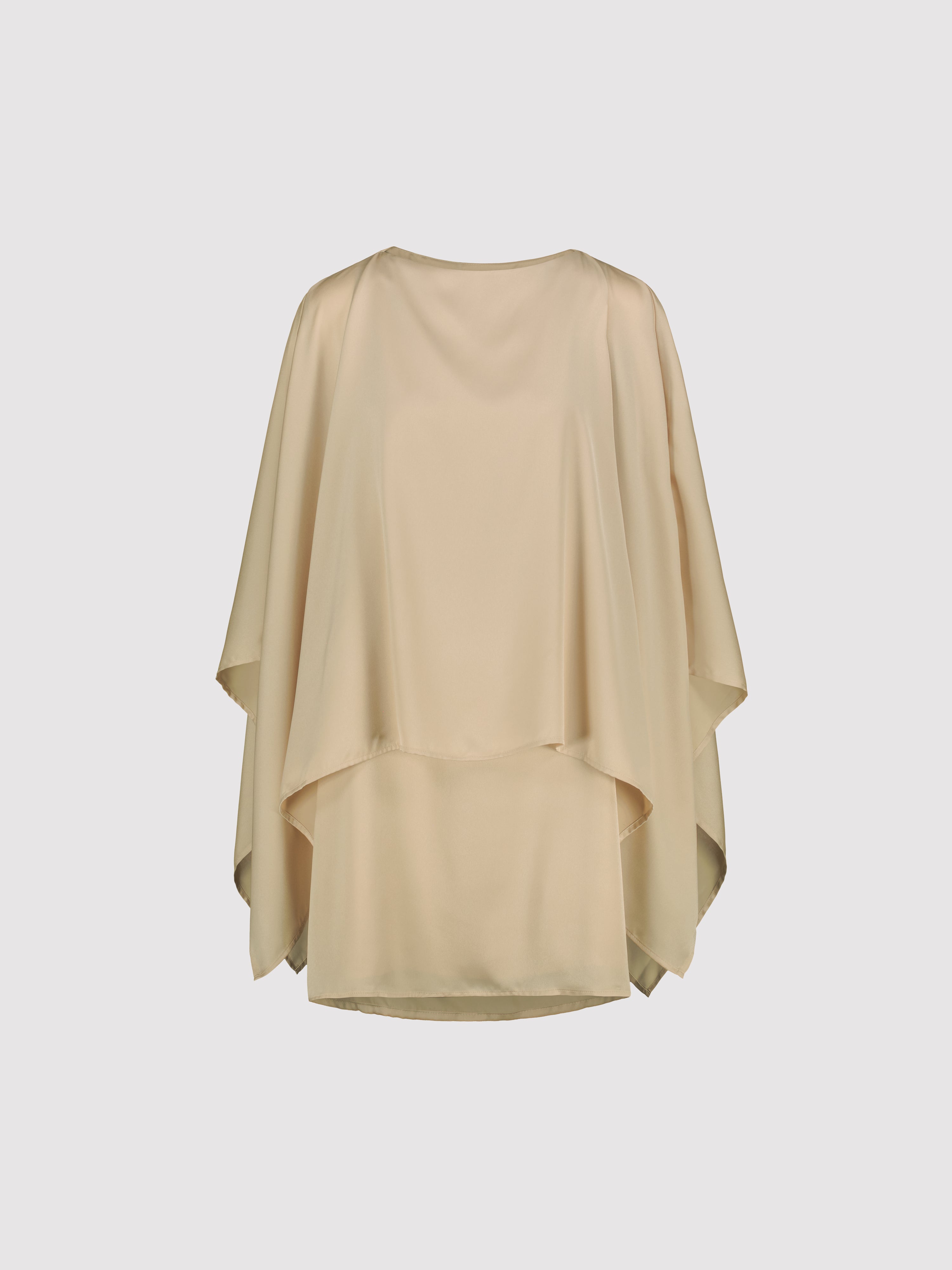 Beige satin dress with a capre on a light gray background
