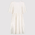 Cream dress on a light gray background