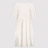 Cream dress on a light gray background