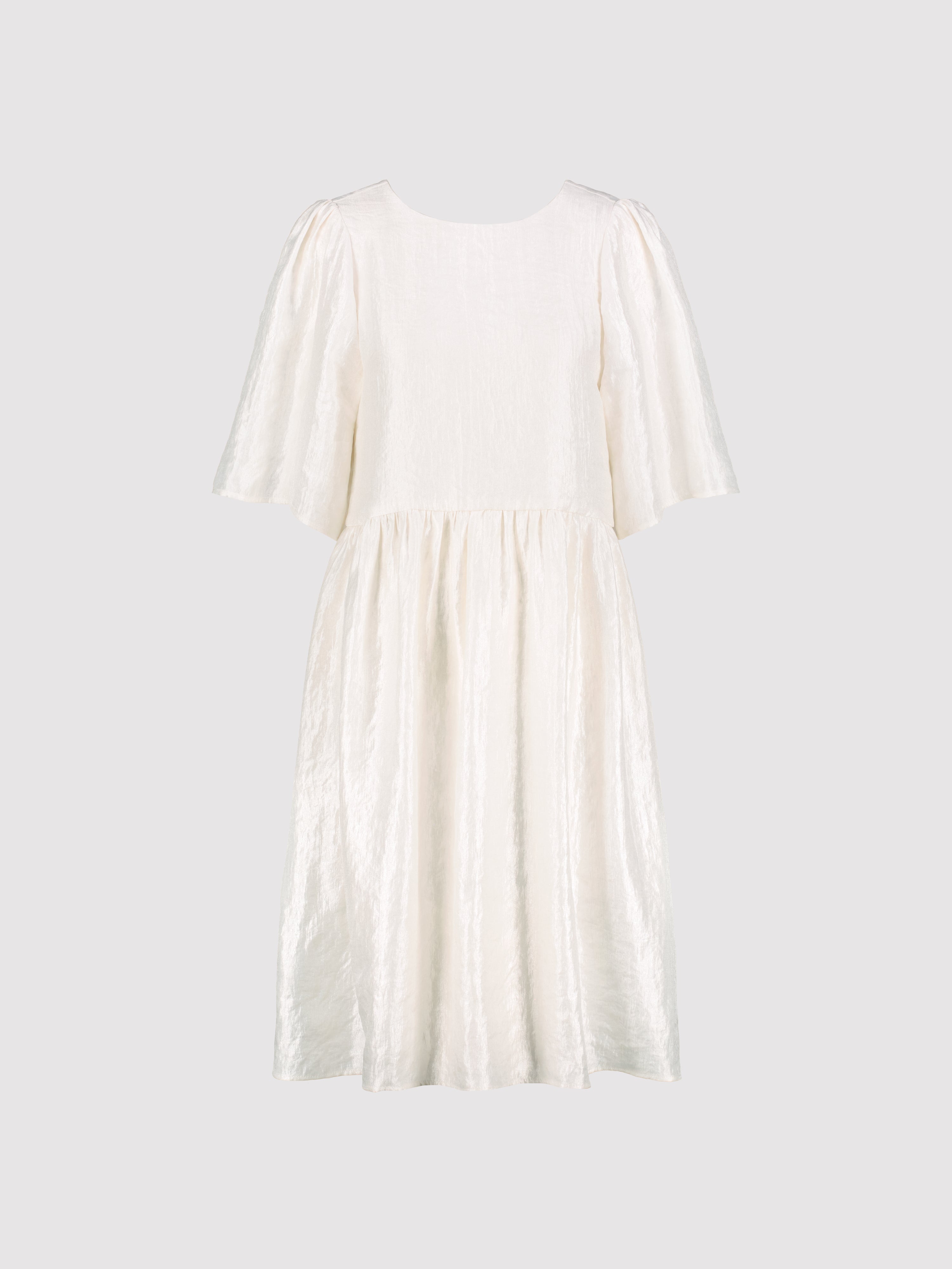 Cream dress on a light gray background