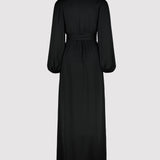 Black dress with long sleeves on a light gray background