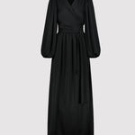 Black dress with long sleeves on a light gray background