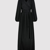 Black dress with long sleeves on a light gray background