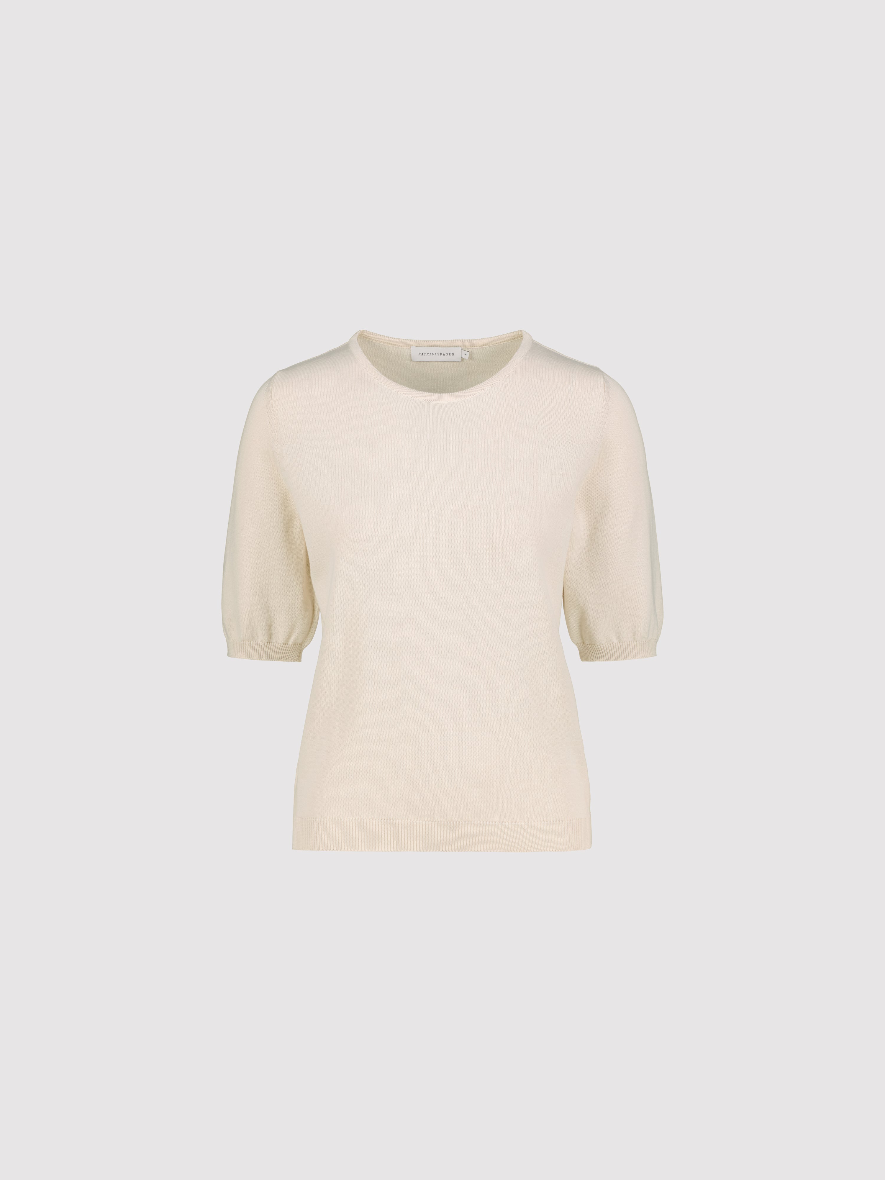 Cream-colored short sleeve sweater on a light gray background