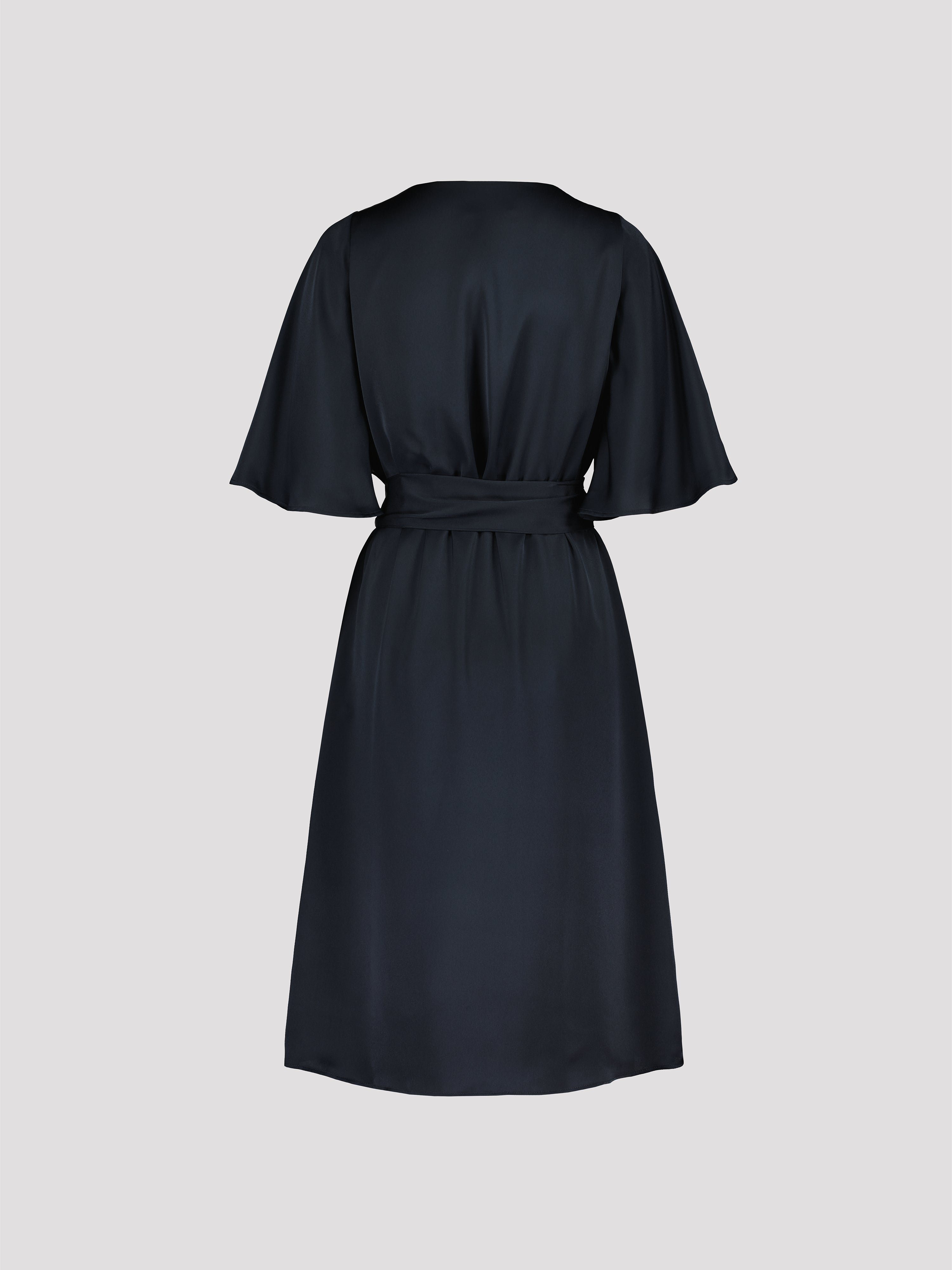 Navy blue dress on a light gray background