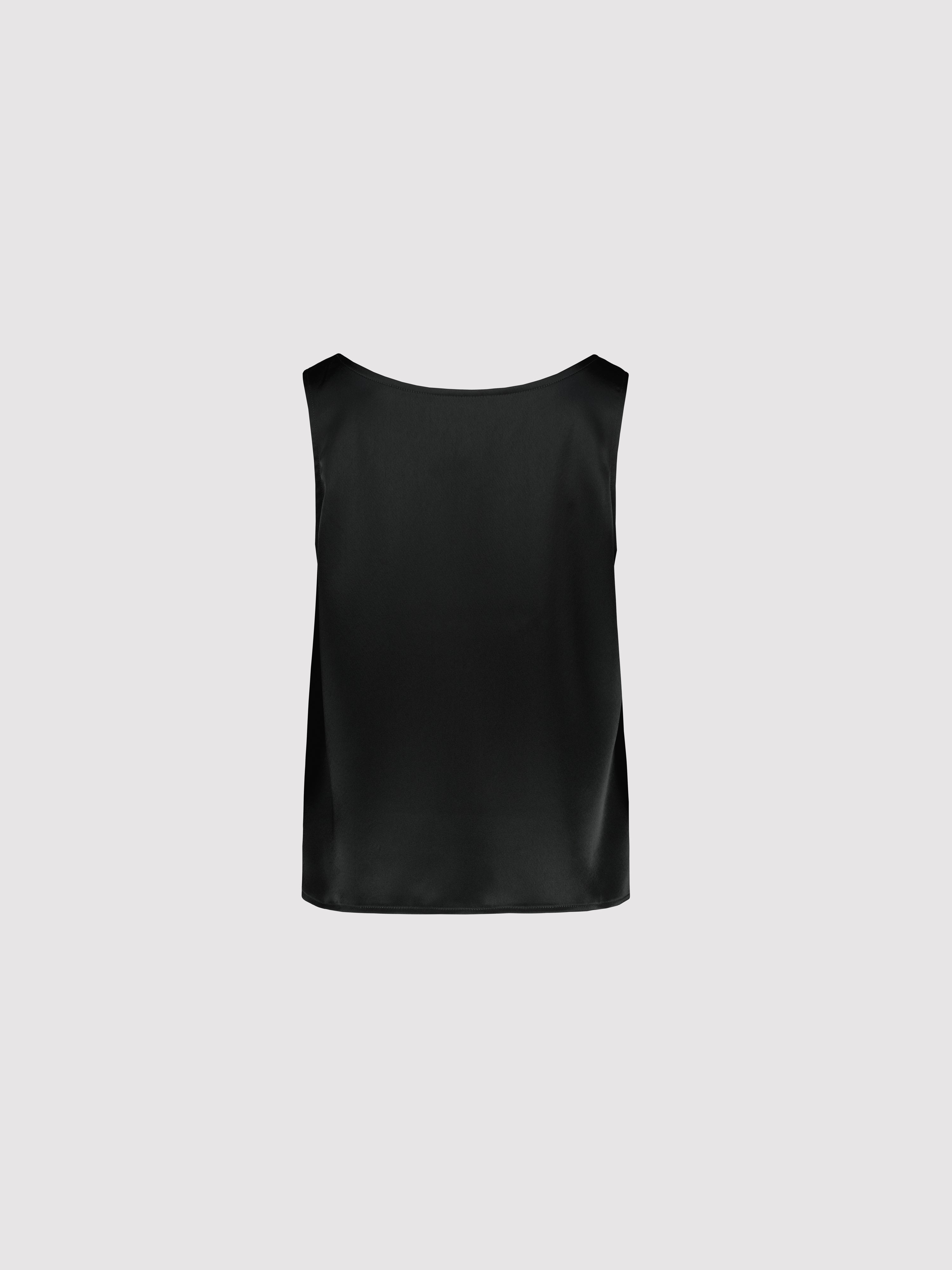 Black sleeveless top on a light gray background