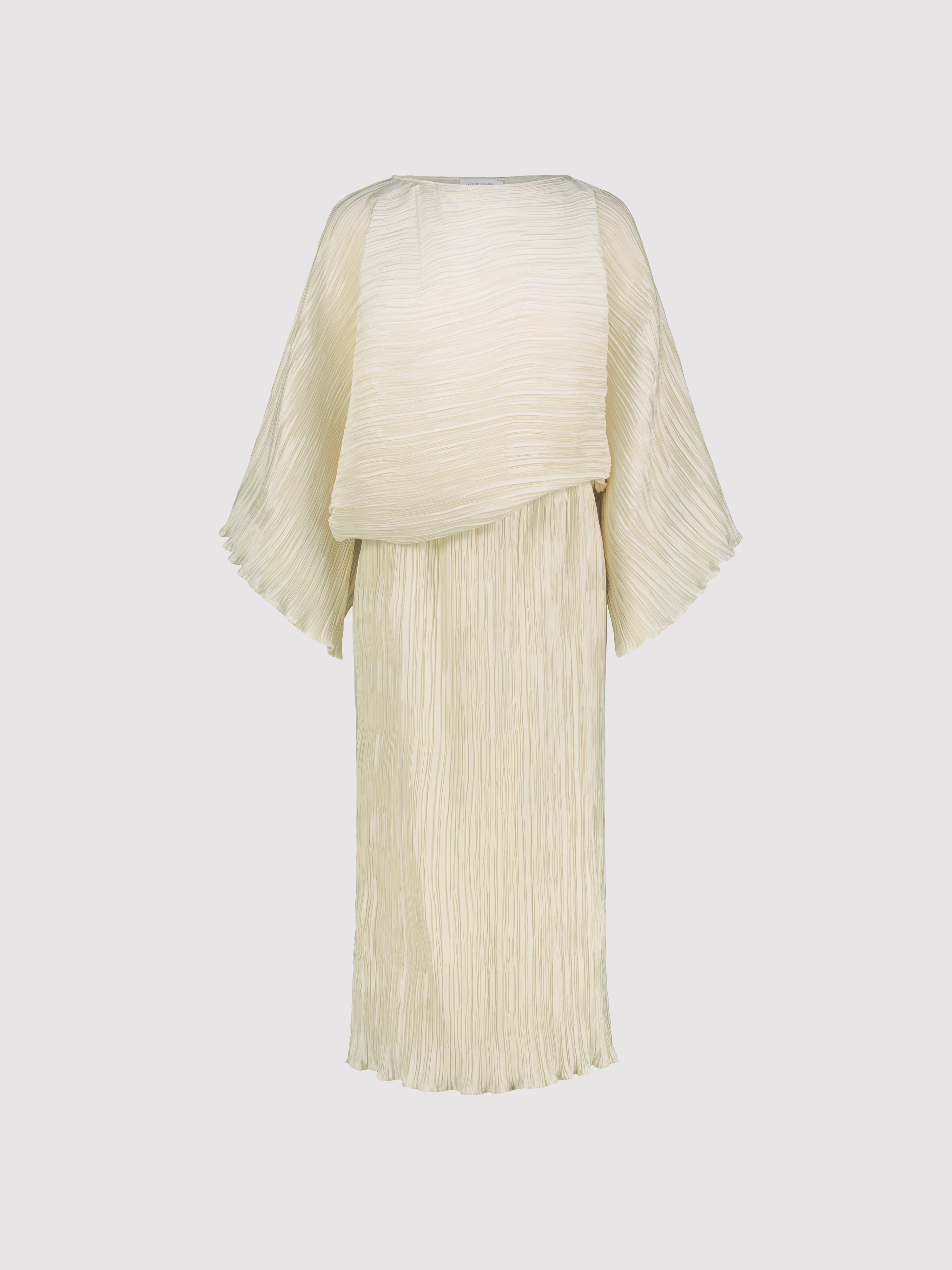 Cream-colored pleated dress on a light gray background