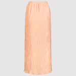 Peach pleated skirt on a light gray background