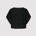 Black pleated blouse on a light gray background