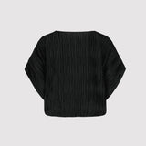Black pleated blouse on a light gray background