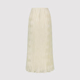 Beige pleated skirt on a light gray background